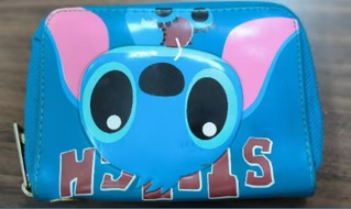 <a href='/2024/1202/c2163a163766/page.html' target='_blank' title='蓝色史迪仔卡通收纳小包'>蓝色史迪仔卡通收纳小包</a>